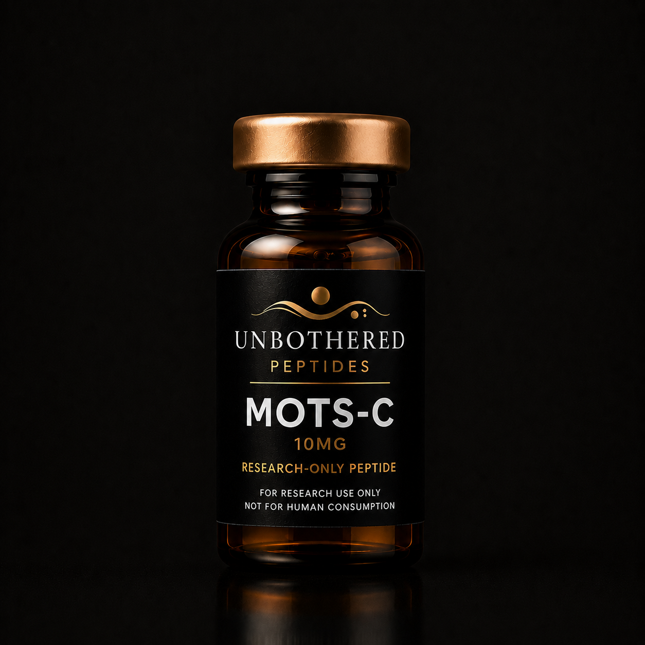 Unbothered Peptides MOTS-C 10mg research peptide in an amber glass vial with a matte black label, gold cap, and black luxury studio background.