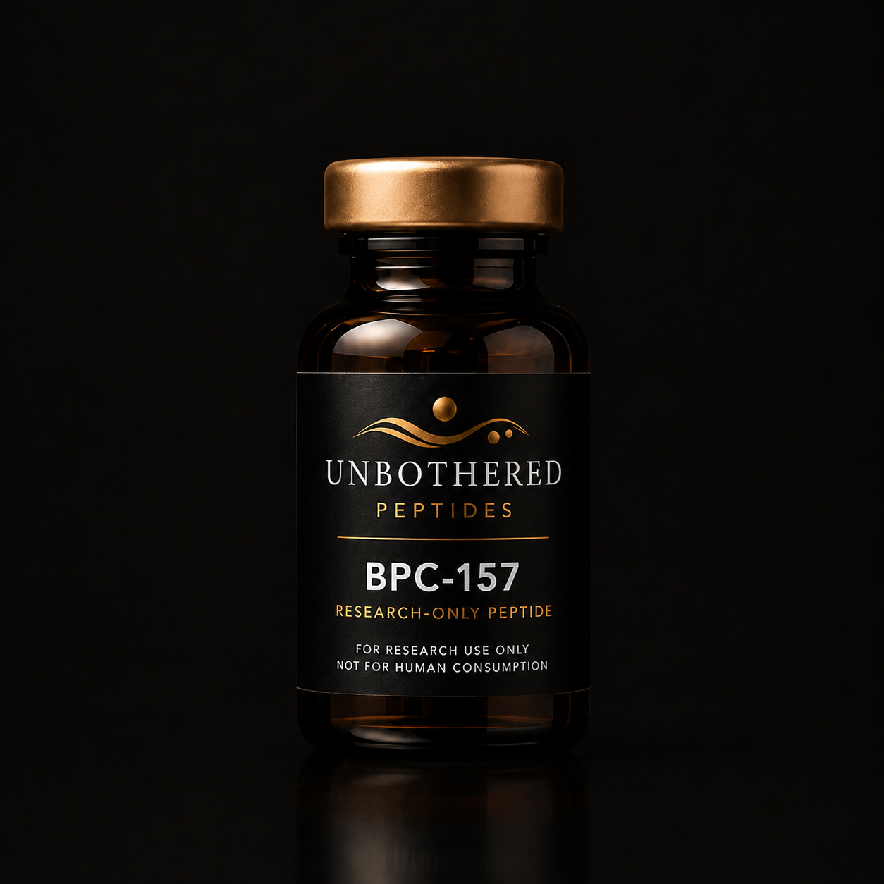 Unbothered Peptides BPC-157 10mg research peptide in an amber glass vial with a matte black label, gold cap, and black luxury studio background.