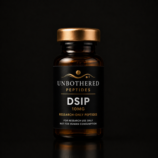 Unbothered Peptides DSIP 10mg research peptide in an amber glass vial with a matte black label, gold cap, and black luxury studio background.