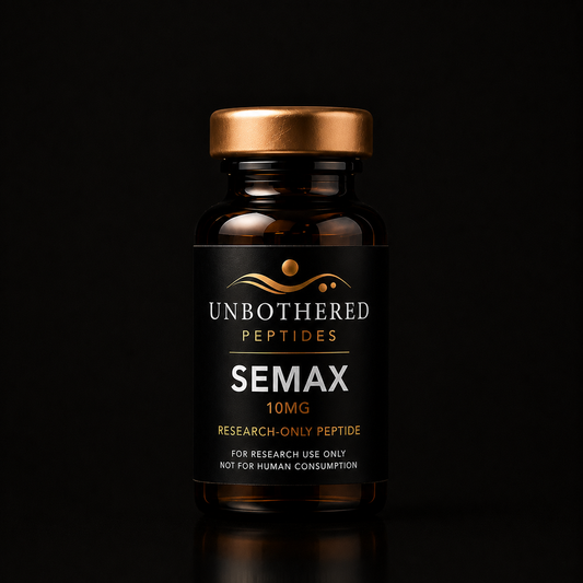 Unbothered Peptides Semax 10mg research peptide in an amber glass vial with a matte black label, gold cap, and black luxury studio background.
